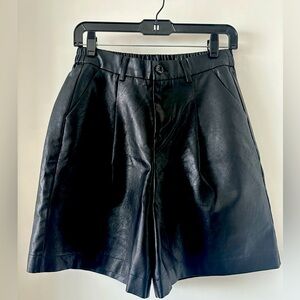 NEGRIS LEBRUM long leather shorts in black — size small